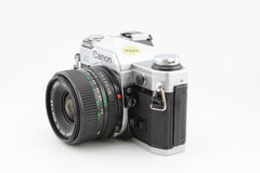 Canon AE-1 + 28mm f2.8 (#3674)