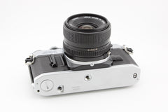 Canon AE-1 + 28mm f2.8 (#3674)