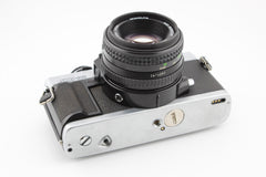 Minolta XG-M + 50mm f1.7 (#3881)