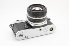 Nikon FE + 50mm f1.4 (#4166)