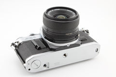 Canon AE-1 + 28mm f2.8 (#4340)