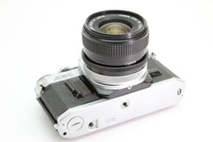 Canon AE - 1 + 28mm f2.8 (#3067) - Canon