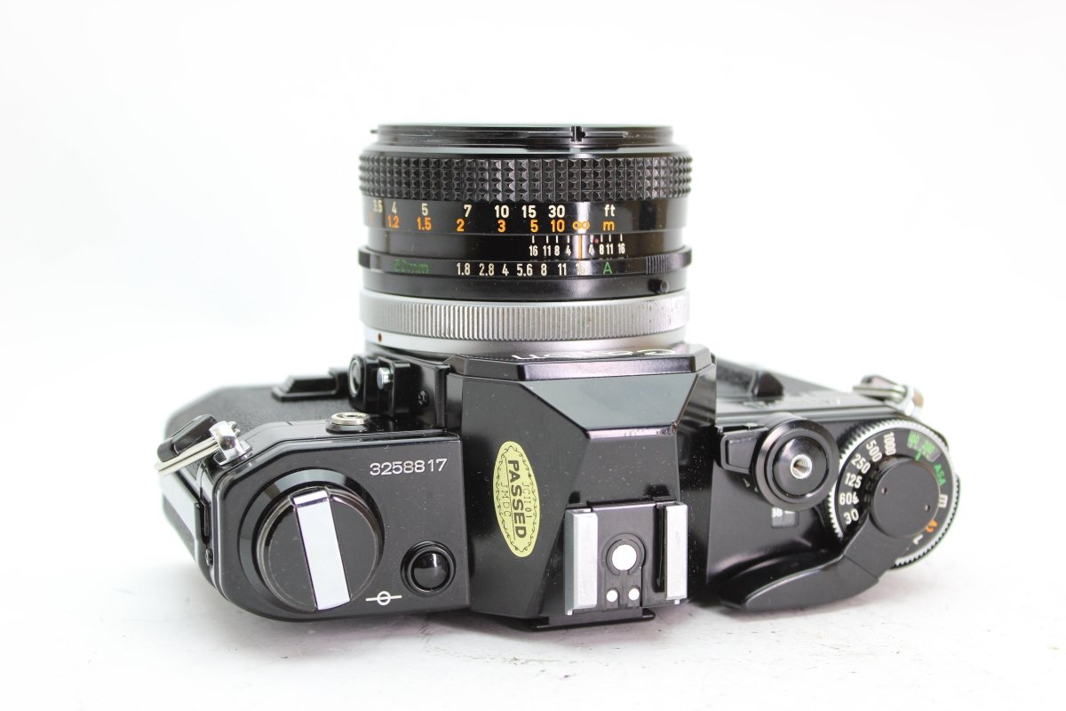 Canon AE-1 + 50mm f1.8 #1940 - Canon