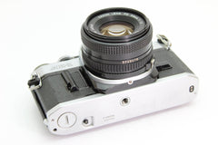 Canon AE - 1 + 50mm f1.8 (#3111) - Canon