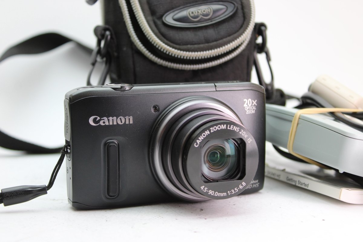 Canon PowerShot SX260 HS - Olympus