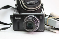 Canon PowerShot SX260 HS - Olympus