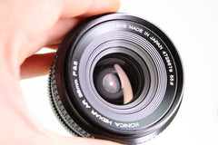 Konica Autoreflex T - 3 + 50mm f1.8 + 28mm f3.5 (#3370) - Konica