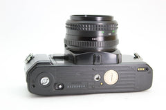 Minolta X-300s + 50mm f1.7 - Minolta