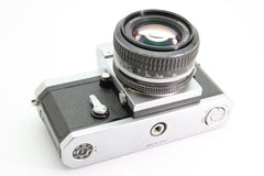 Nikon F + 50mm f1.4 (#3231) - Nikon