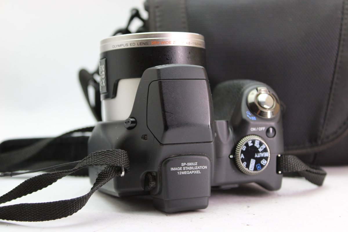Olympus SP-590UZ - Olympus