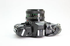 Canon AE-1 + 50mm f/1.8 - Canon - FD