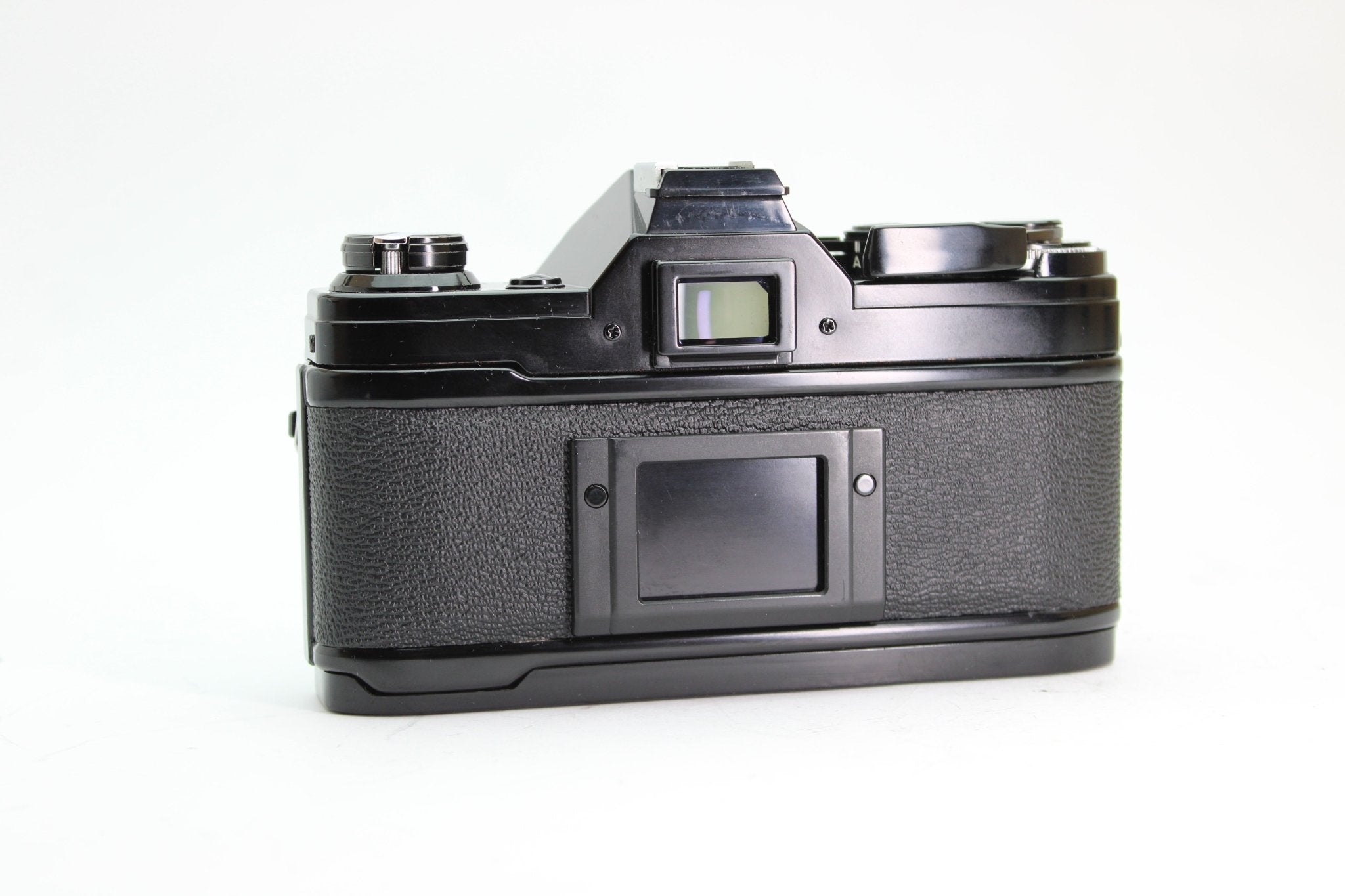 Canon AE-1 + 50mm f/1.8 - Canon - FD