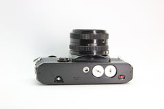Canon EF + 50mm f/1.8 - Canon