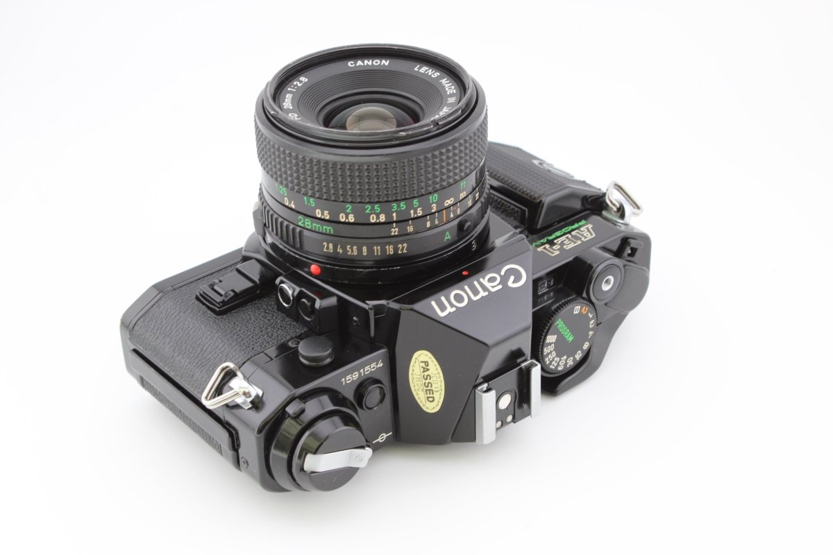 Canon AE - 1 Program + 28mm f2.8 (#3803) - Canon